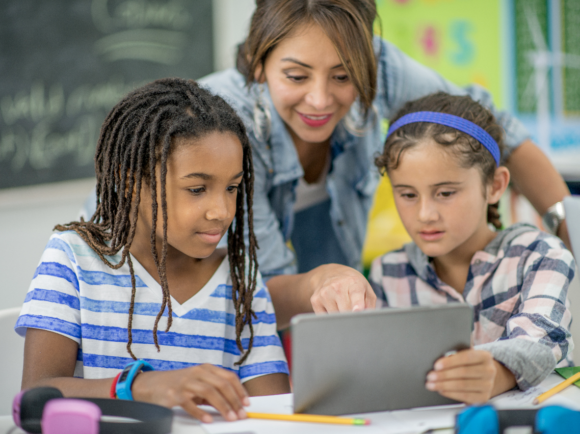 Teacher with two female students